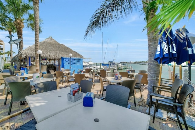 view of terrace featuring a water view