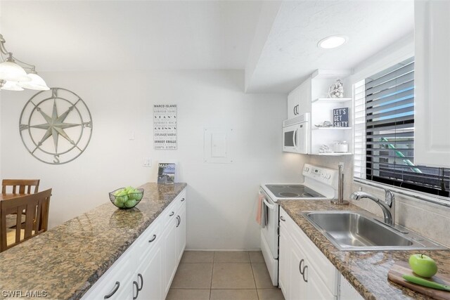 kitchen featuring white cabinetry, decorative light fixtures, white appliances, sink, and light tile floors