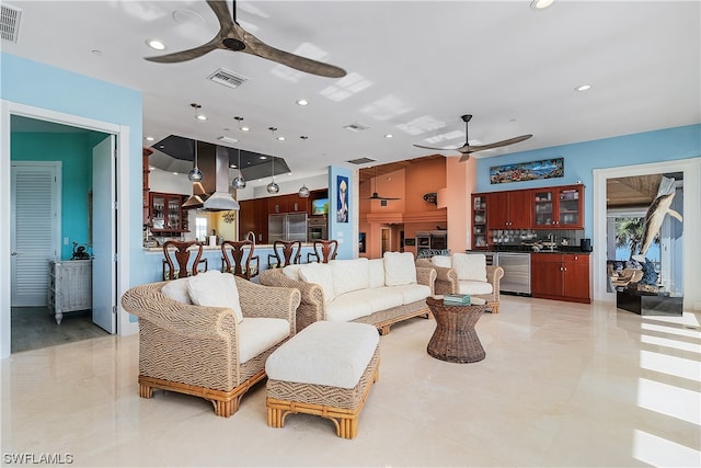 living room with ceiling fan