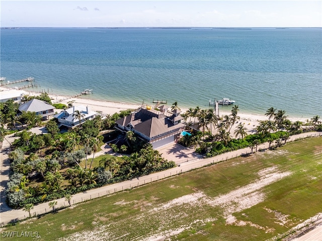 bird's eye view with a beach view and a water view