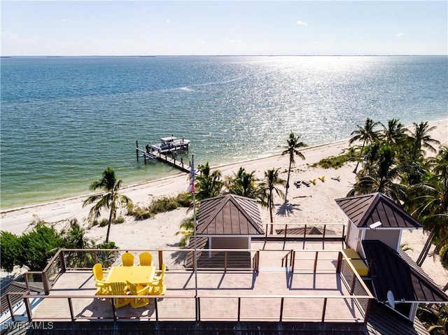 211 Kingfisher Dr, Captiva, FL 33924 - exterior space with a dock and a view of the beach