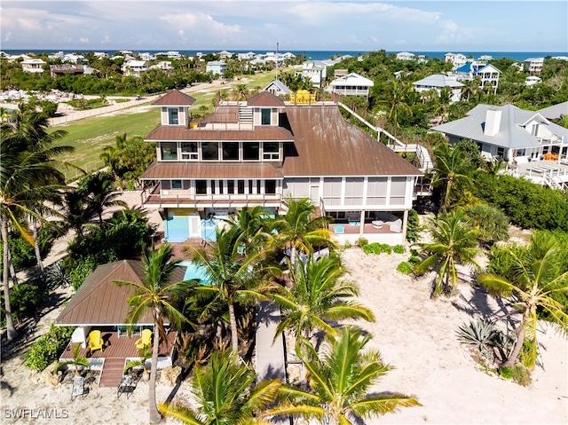 aerial view featuring a water view