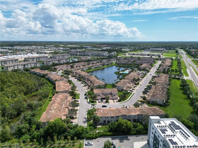 bird's eye view with a water view