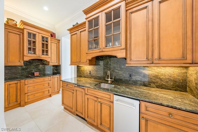 kitchen featuring dark stone countertops, white dishwasher, tasteful backsplash, and sink