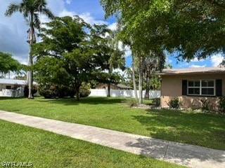 exterior space featuring a front yard