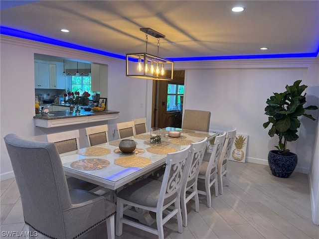 dining space featuring a notable chandelier