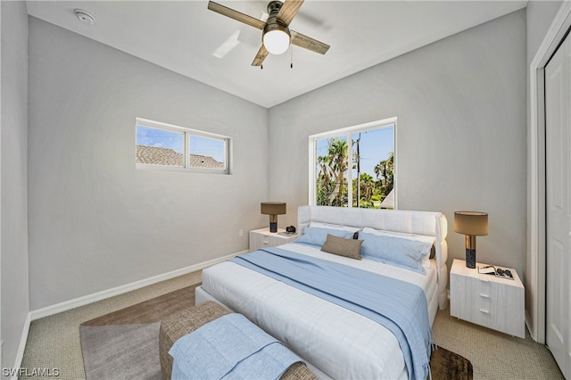 bedroom featuring ceiling fan and carpet floors