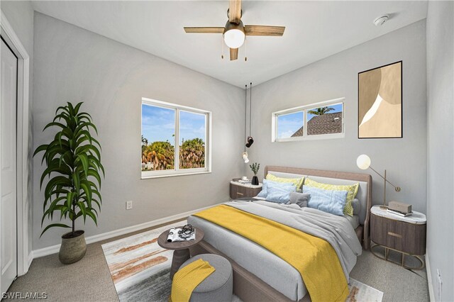 bedroom with carpet flooring and ceiling fan