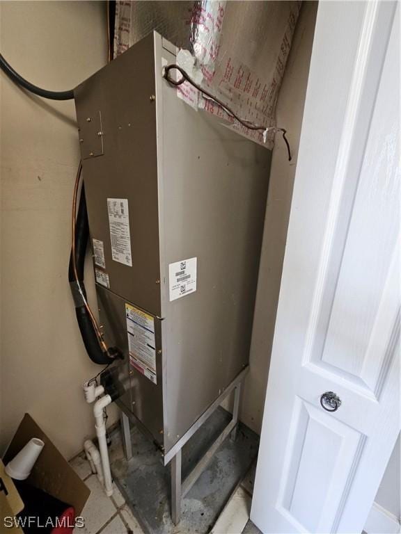 utility room with heating unit