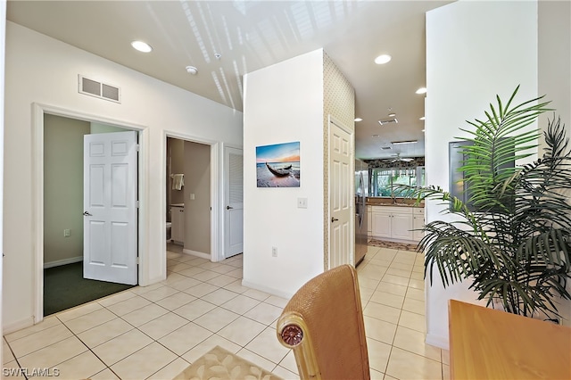 interior space featuring light tile flooring