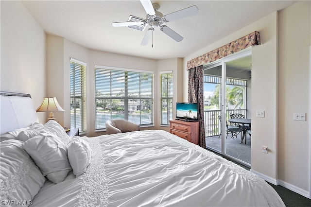 carpeted bedroom with ceiling fan and access to outside