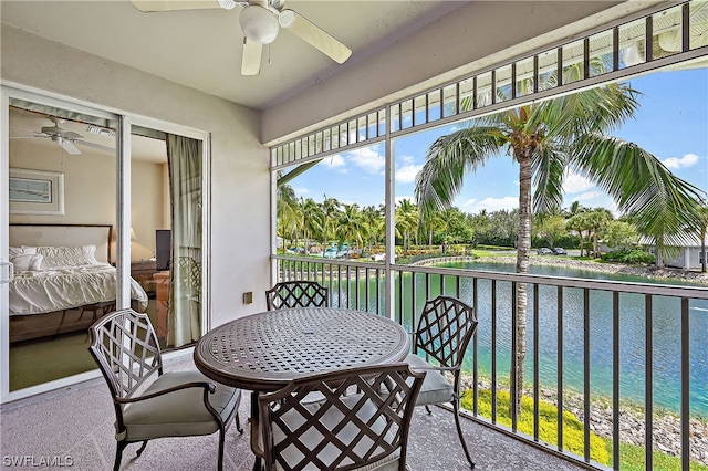 balcony featuring ceiling fan