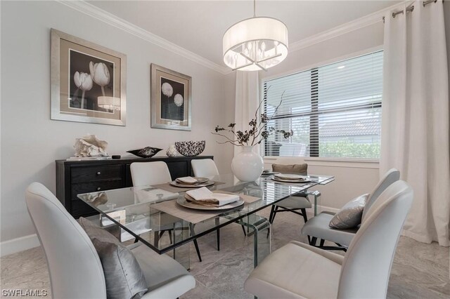 dining space with a chandelier and ornamental molding