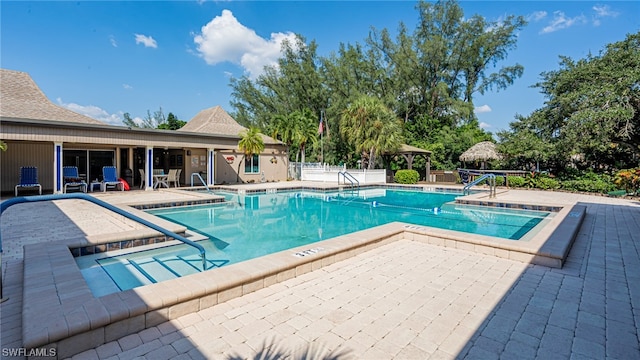 view of pool with a gazebo and a patio