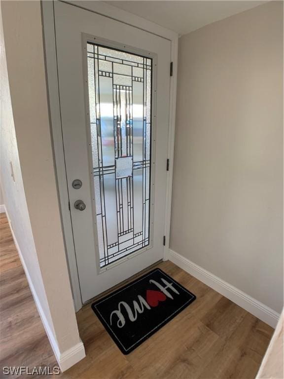 doorway featuring hardwood / wood-style flooring