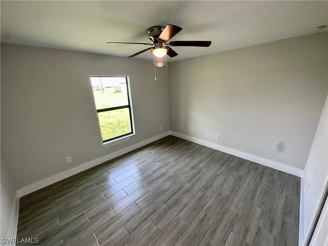 unfurnished room featuring ceiling fan and wood-type flooring