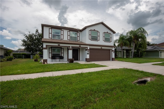 view of front of property with a front lawn and a garage