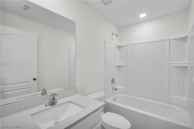 full bathroom with vanity, shower / tub combination, and toilet