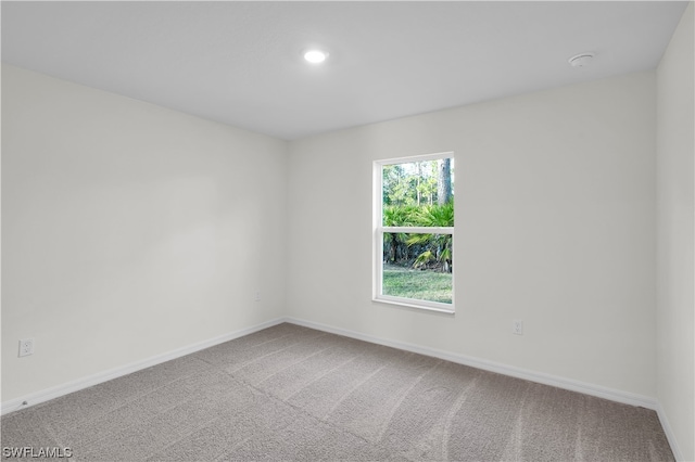 view of carpeted spare room