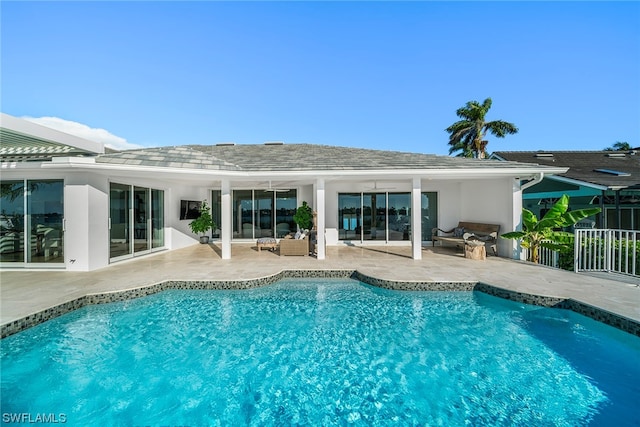 view of swimming pool featuring a patio