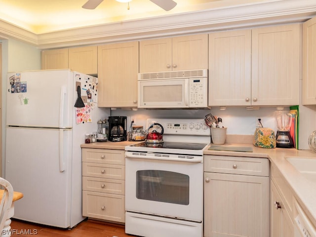 kitchen featuring light hardwood / wood-style flooring, ceiling fan, white appliances, and crown molding