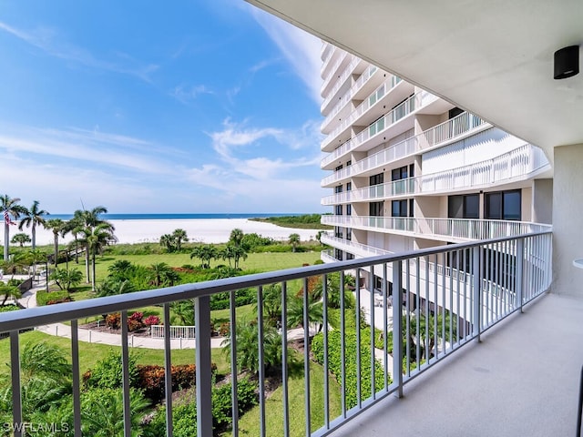 balcony featuring a water view