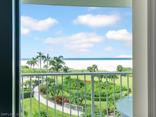 balcony featuring a water view