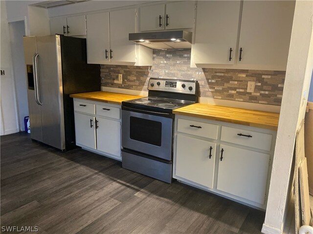 kitchen with wood counters, backsplash, white cabinets, appliances with stainless steel finishes, and dark hardwood / wood-style flooring