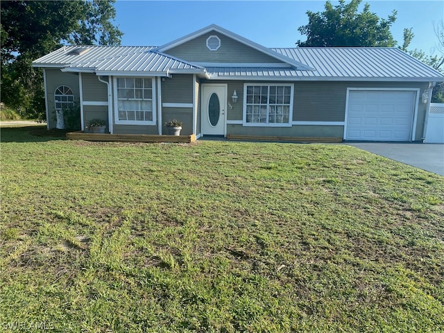 ranch-style house with a front yard and a garage