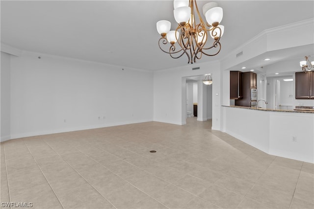 unfurnished living room featuring ornamental molding, a chandelier, and light tile patterned flooring