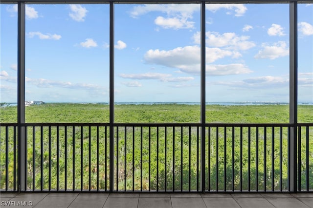 unfurnished sunroom with a wealth of natural light