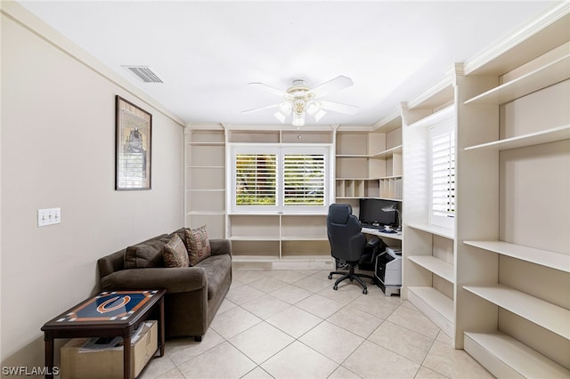 office with ceiling fan, light tile patterned floors, and crown molding