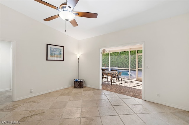 spare room with lofted ceiling