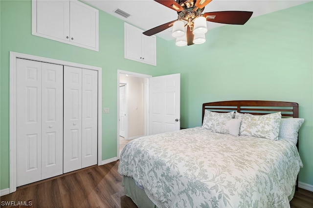 bedroom with ceiling fan, a closet, and dark hardwood / wood-style floors