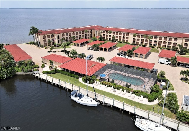 birds eye view of property featuring a water view