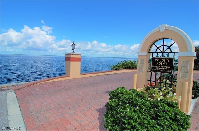 exterior space with a water view