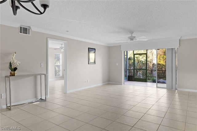 tiled empty room featuring a textured ceiling, ceiling fan, and crown molding