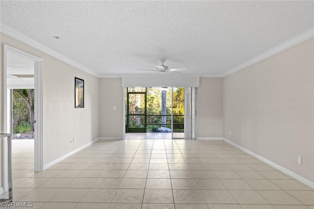 tiled spare room featuring ceiling fan and crown molding