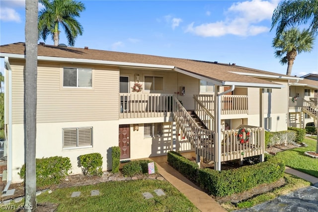 view of front facade featuring a wooden deck