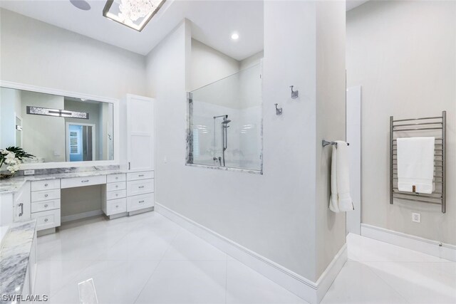 bathroom with walk in shower, tile floors, radiator heating unit, and oversized vanity