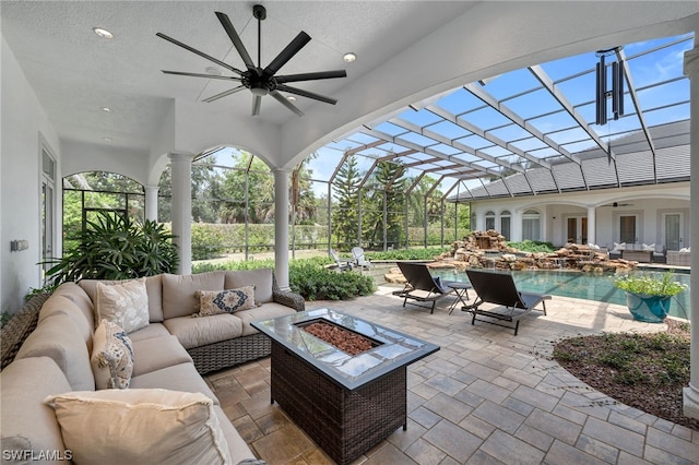view of patio featuring outdoor lounge area and ceiling fan