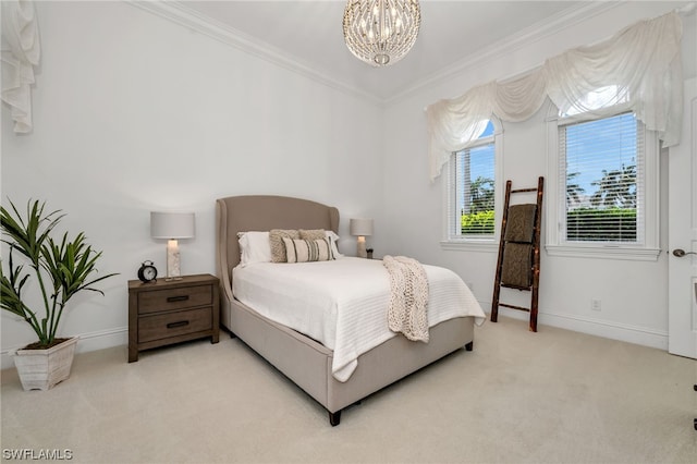 carpeted bedroom featuring an inviting chandelier and ornamental molding