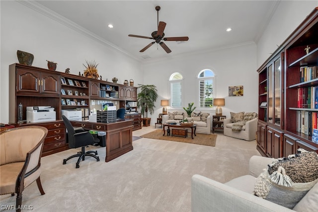 office with light carpet, crown molding, and ceiling fan