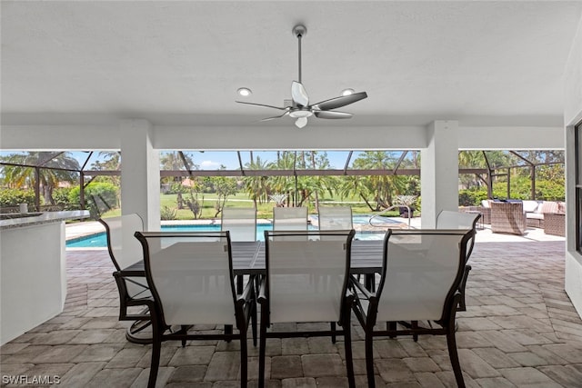 sunroom / solarium with ceiling fan