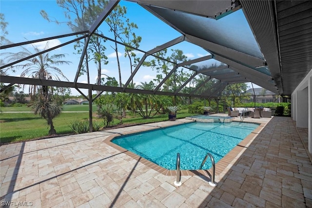 view of swimming pool featuring glass enclosure, a patio, a lawn, and a pool with connected hot tub