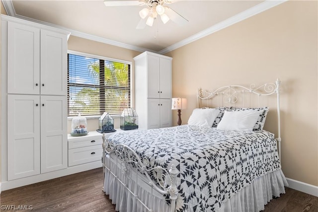 bedroom with crown molding, dark hardwood / wood-style floors, and ceiling fan