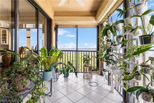 sunroom / solarium with ceiling fan