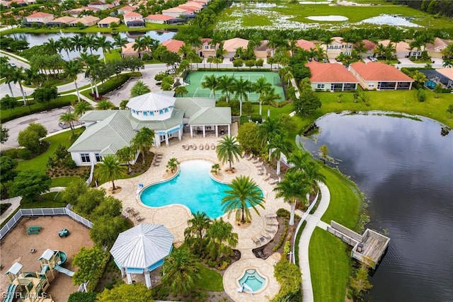 bird's eye view with a water view