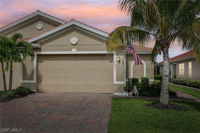 view of front of property featuring a garage