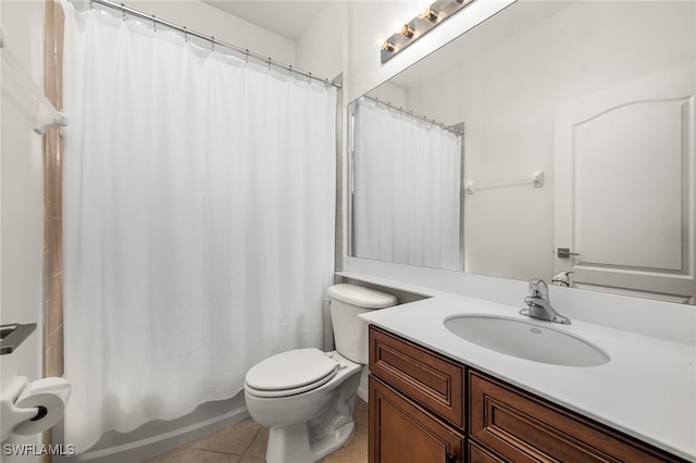 full bathroom featuring shower / bath combination with curtain, vanity, toilet, and tile patterned floors